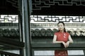 Chinese cheongsam model in Chinese classical garden